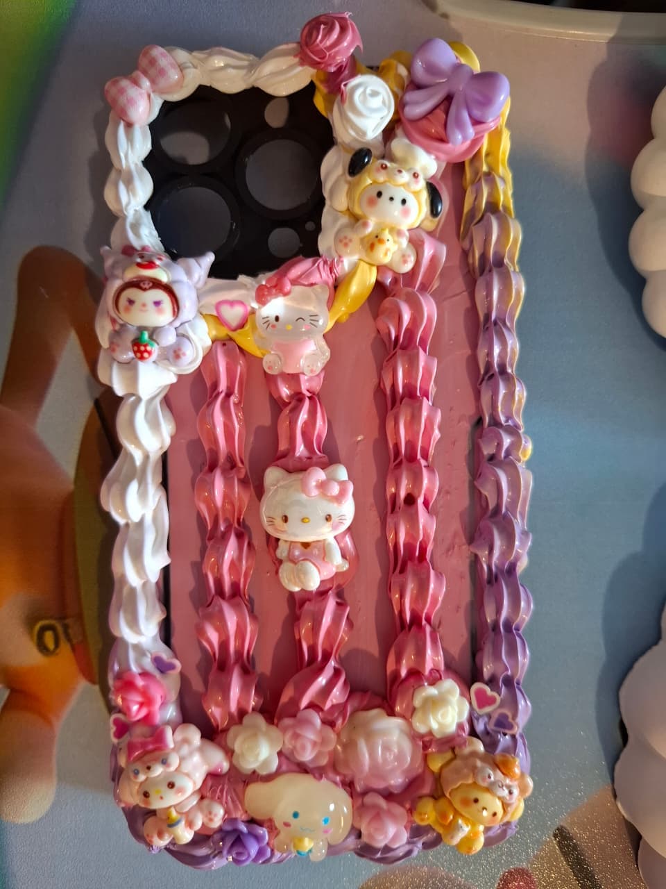 Pink and lavender Sanrio-themed decoden phone case, handmade